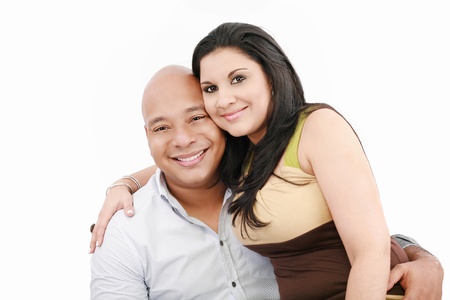 Portrait of a beautiful young happy smiling couple - isolatedの写真素材