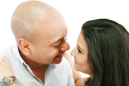 Couple looking lovingly at each other の写真素材