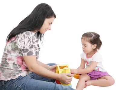 Mom plays with her daughter の写真素材