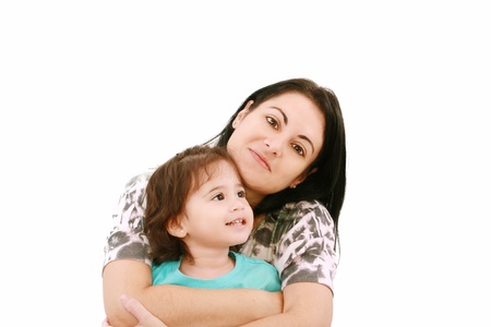 A portrait of a mother and her baby girl  smiling over white backgroundの写真素材