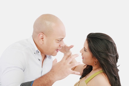 Studio shot of a young couple fighting の写真素材