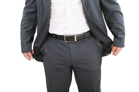 Businessman with empty pockets の写真素材