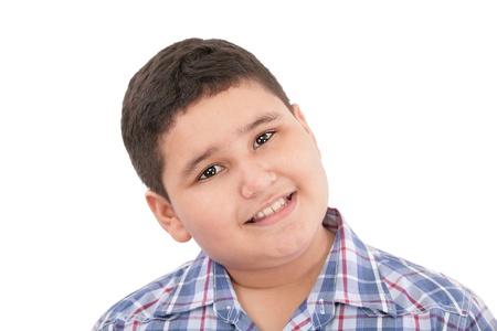 Portrait of happy little boy over white background の写真素材
