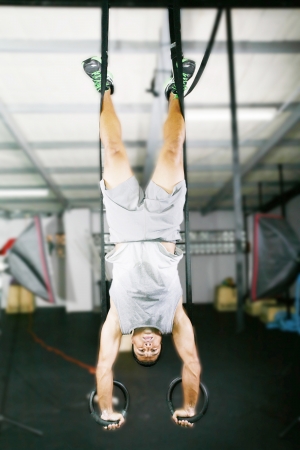 The sportsman the guy, carries out difficult exercise, sports gymnasticsの写真素材
