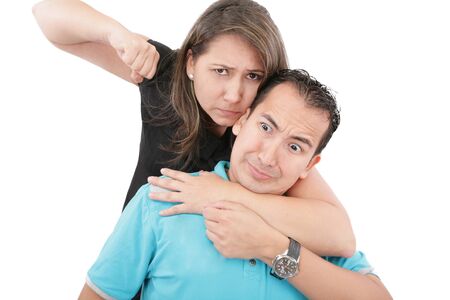 Man and woman conflict. Home violence concept. Isolated on white の写真素材