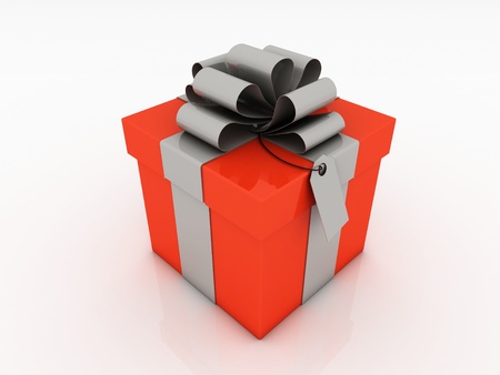 Gift box with silver ribbon bow isolated on white background の写真素材