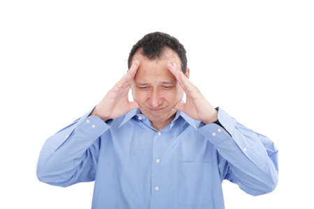 Stressed business man with a headache, isolated over whiteの写真素材