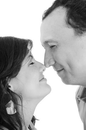 happy young couple portrait smiling isolated over a white background の写真素材