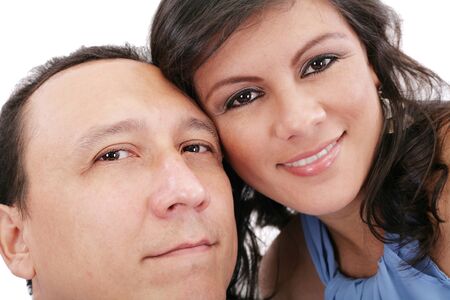 Closeup portrait of a sweet young couple smiling together の写真素材