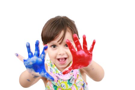 Little girl with painted hands の写真素材