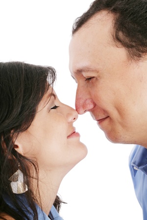 happy young couple portrait smiling isolated over a white background の写真素材