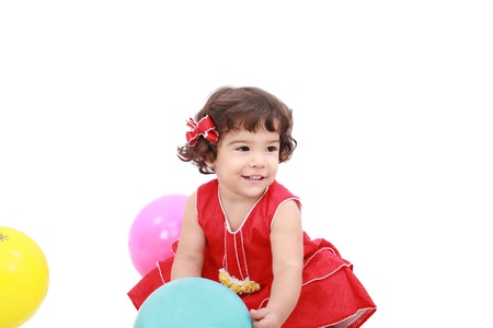funny little girl playing, isolated on whiteの写真素材