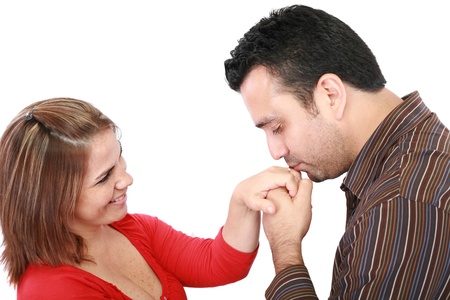Husband kissing hand of smiling wifeの写真素材