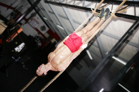 Crossfit Rope Training on a dark background.の写真素材