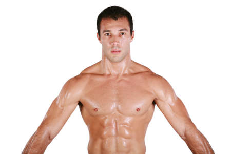 Muscular shirtless man after work out, looking at cameraの写真素材