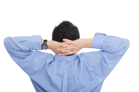 Closeup portrait of young businessman from the back. Sitting with opened arms on his armchair. Isolated over white background 
の写真素材