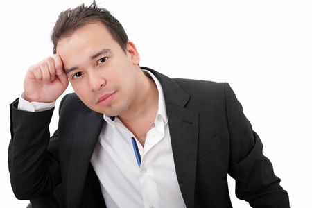 Picture of a pensive young businessman, isolated on white background の写真素材