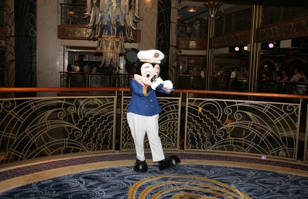 ORLANDO, FL - FEB 3:  Popular Cartoon Character Mickey Mouse signing autograph before a presentation of Walt Disney Theatre in the new Disney Cruise Dream on Feb 3, 2013 on Orlando, Florida.のeditorial素材