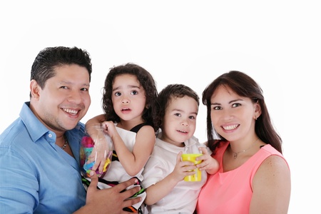 Portrait of young couple having fun with their daughter and son. Isolated on white background.の写真素材