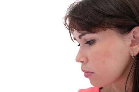 Depressed, sad woman on white background の写真素材