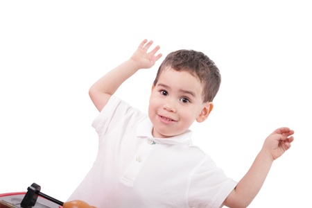 Portrait of happy little boy over white background の写真素材