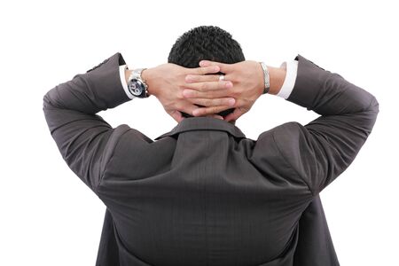back of businessman holding hands on head on white background の写真素材