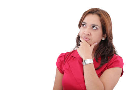 portrait of a beautiful young businesswoman with a thinking expression, isolated on whiteの写真素材