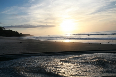 Sunrise over sea and lakeの写真素材