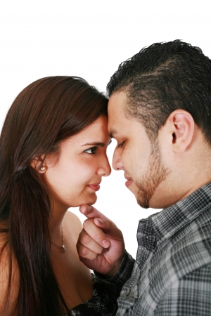 Portrait of Attractive Hispanic Couple on White Background の写真素材