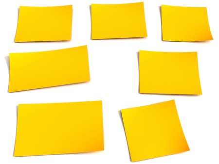 Yellow stick note isolated on white backgroundの写真素材