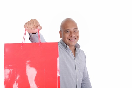 picture of handsome man with shopping bagsの写真素材