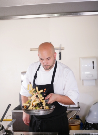chef prepare tasty food in kitchen の写真素材