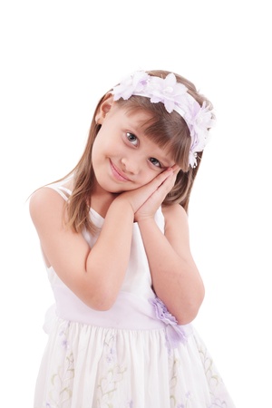 happy smiling little girl on white background in studio の写真素材
