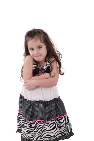 Brunette little girl isolated on a over white background の写真素材