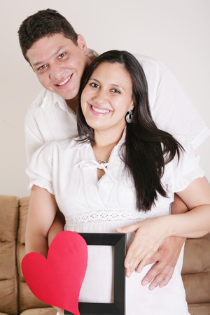 pregnant women with her husband waiting for her babyの写真素材