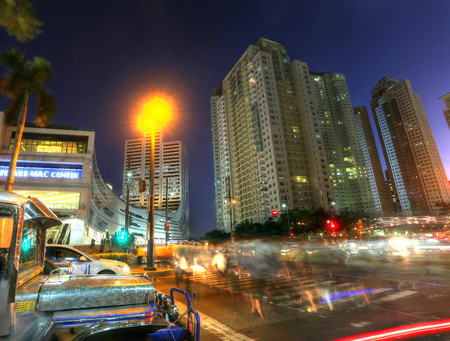 MANILA - MAY 17: Sunset of Bonifacio Global City in Taguig City on May 17, 2015 in Manila,...