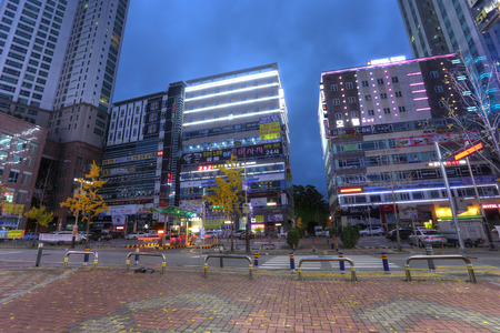 SUWON, KOREA - NOV 13, 2015: Street of Suwon city in Korea in the twilight on Nov 13, 2015. Suwon is...