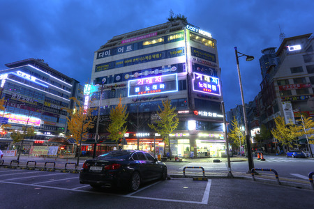 SUWON, KOREA - NOV 13, 2015: Street of Suwon city in Korea in the twilight on Nov 13, 2015. Suwon is a major educational center, home to 11 universities.のeditorial素材
