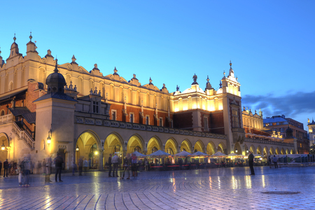 KRAKOW, POLAND, JUL 4: Sukiennice - The Cloth Hall in the sunset in Market Square in Poland  is one of the city's most recognizable icons in Krakow, Poland on July 4, 2017.のeditorial素材