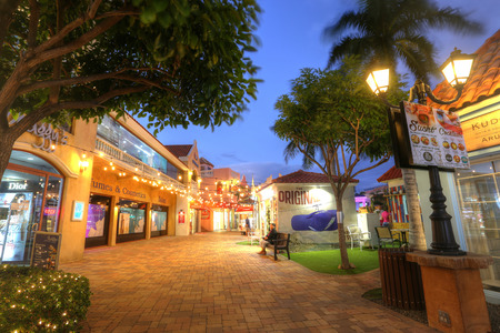 Aruba, Feb 7: POV of Palm Beach which is a world famous street containing high rise hotels and restaurants in the twilight in Aruba on Feb 7, 2018.のeditorial素材