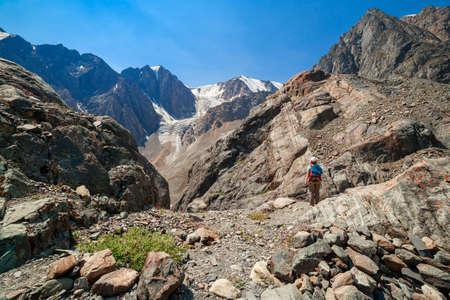 A girl in the Altai Mountains. The road to the Bolshoy Aktru glacier.の写真素材