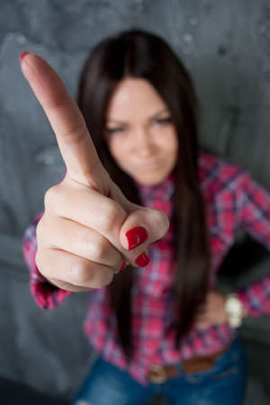 The young Girl shakes fingerの写真素材