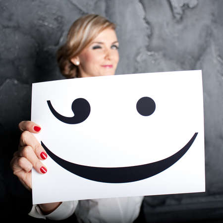 The beautiful Girl lovely smiles, causing positive emotionsの写真素材