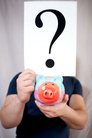 smiling man with his piggybank