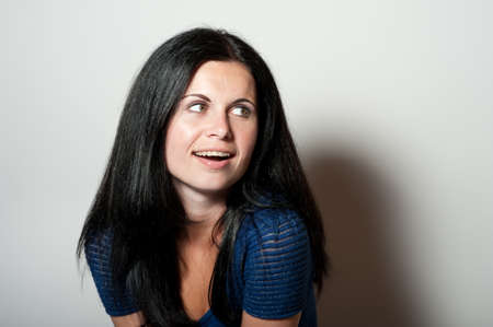 Beautiful young woman, studio photo