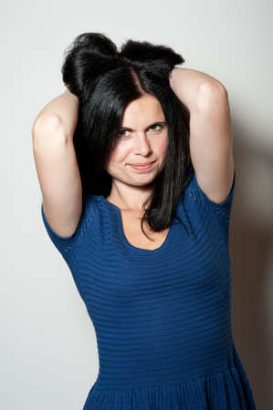 Beautiful young woman, studio photoの写真素材