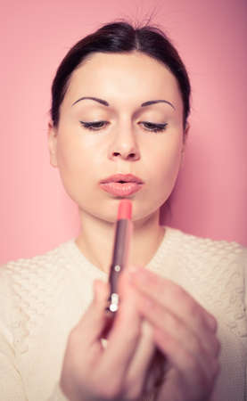 Part of attractive woman's face with fashion red lips make upの写真素材