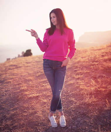 Woman enjoying freedom and life on beautiful and magical sunset. relaxed and happy.
の写真素材