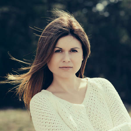 Fashion woman outdoor portrait. Beautiful girl posing on the street の写真素材