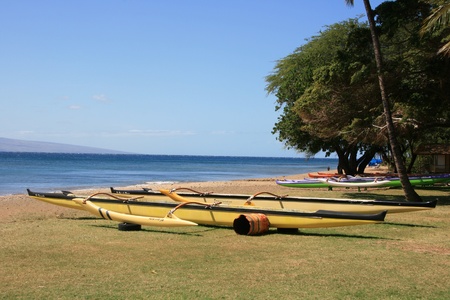 Beached outrigger canoeの写真素材